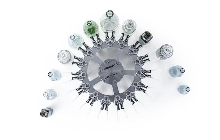 Tecnovino máquinas estrella multiformato botellas vino Clamping Star Tyrolon de New Group Maquinaria Moderna